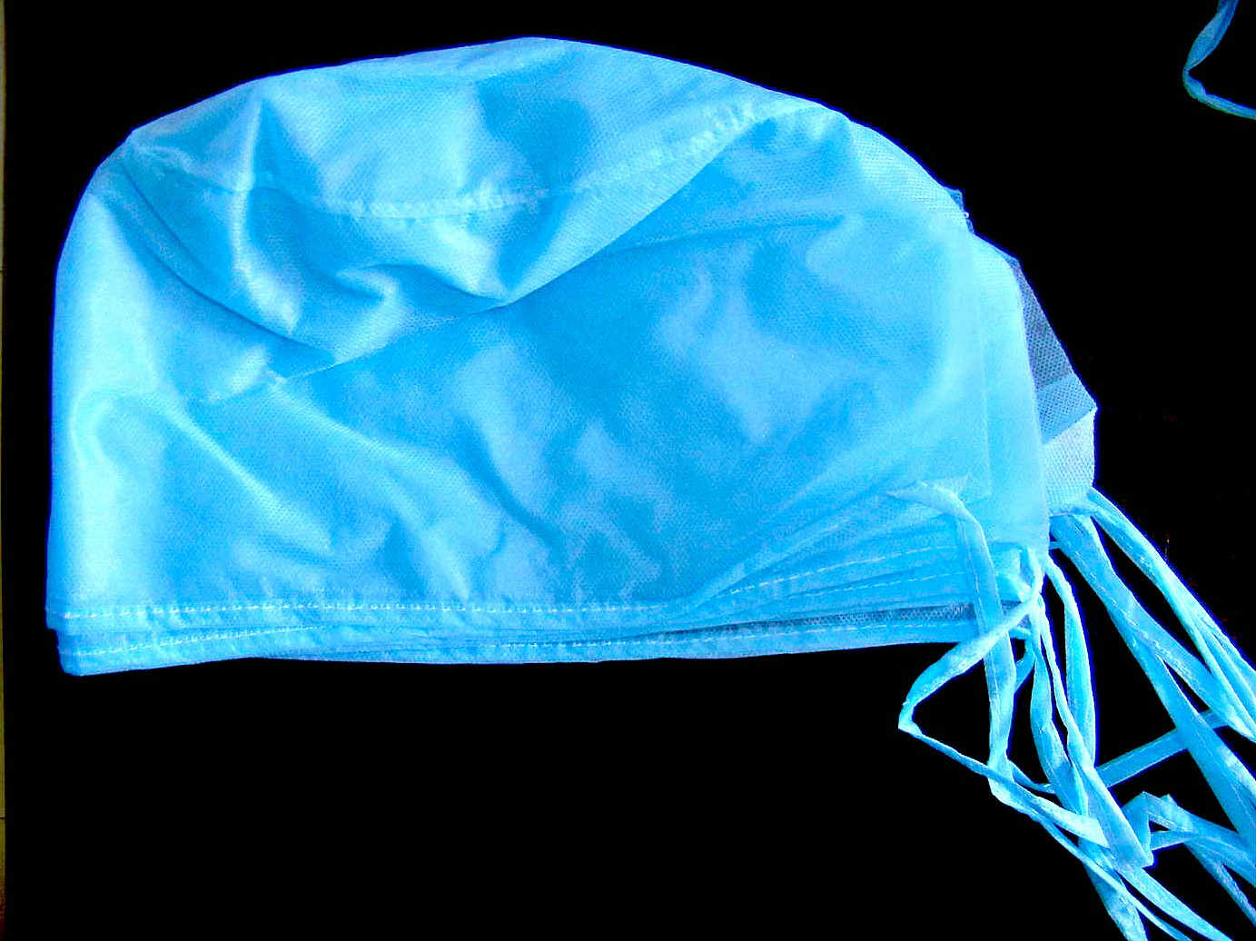 Surgical cap with ties